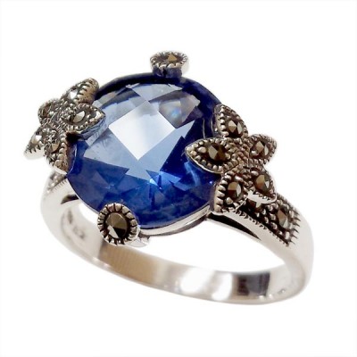 MS Ring Rd Tanzanite W/ Flower Ms On Both Side