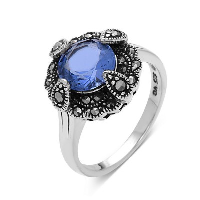 MARCASITE RING 8MM TANZANITE GL ON MARCASITE PAVE FLOWER