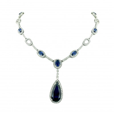 Sterling Silver Ncklace Blue Rare Earth Tear Drop with Clear Cubic Zirconia Around