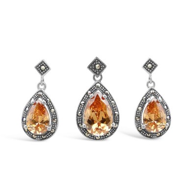 MARCASITE SET CHAMPAGNE CUBIC ZIRCONIA TEARDROP WITH RHOMBUS MS TOP